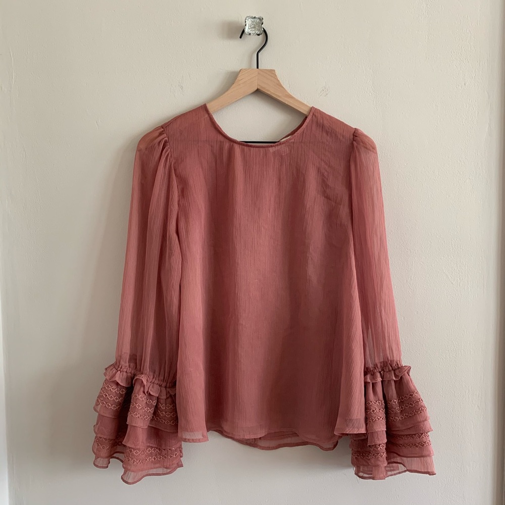 Pink ruffle bell sleeve shear blouse